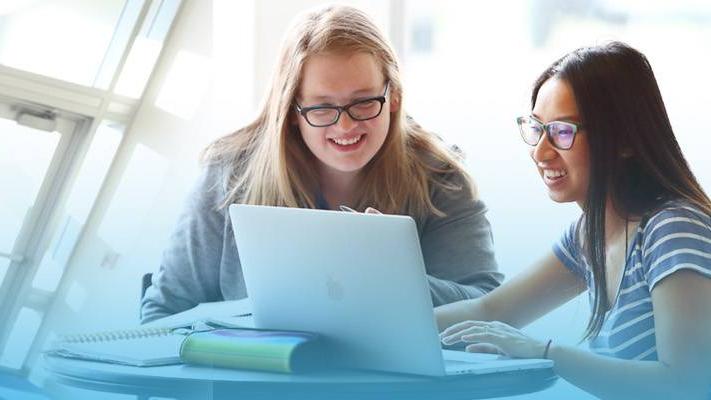 Students studying with laptop